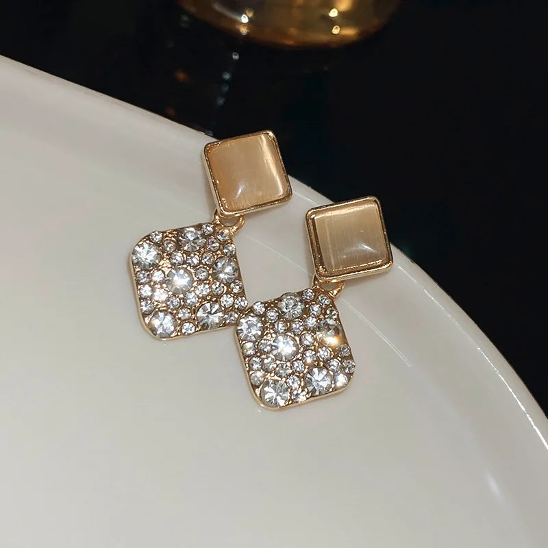 Elara Hollow Cross Stud Earrings